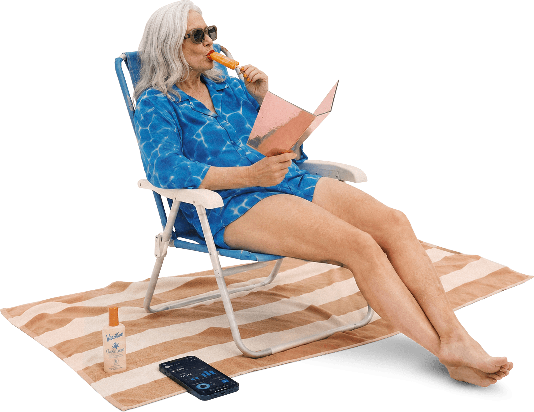 Woman relaxing on a beach chair holding a phone with the Properly app